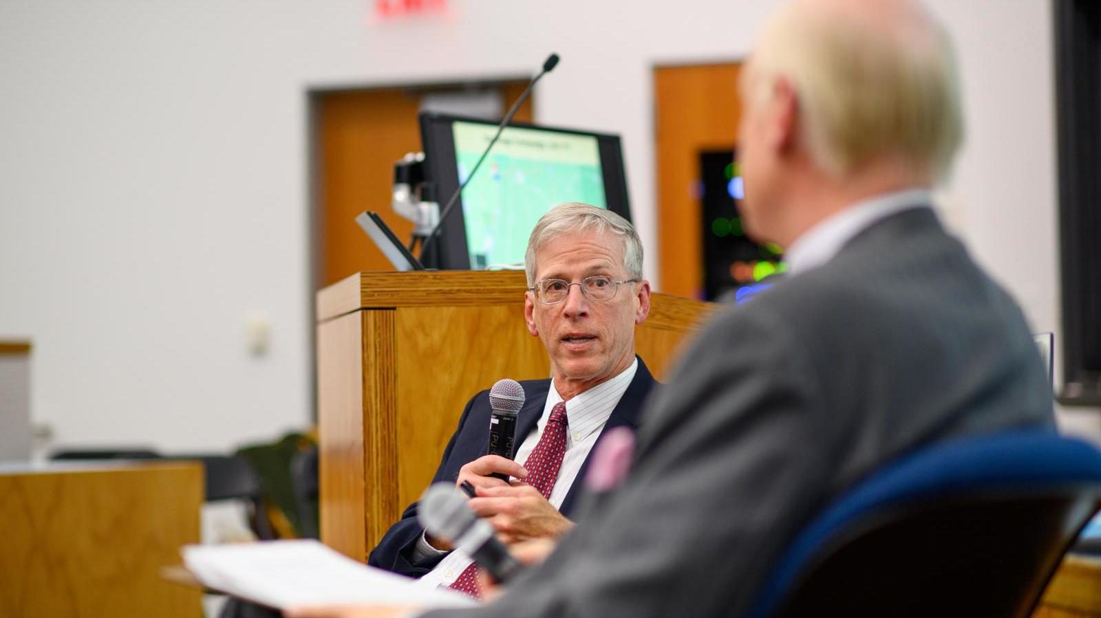 Kevin speaking at a Princeton event