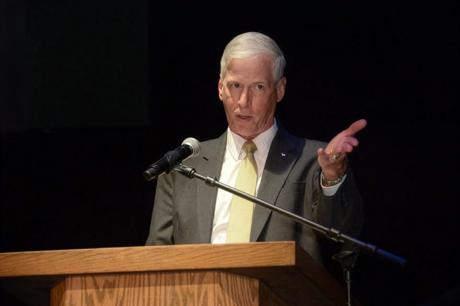 Kevin Weddle, military historian, giving a lecture at a lectern